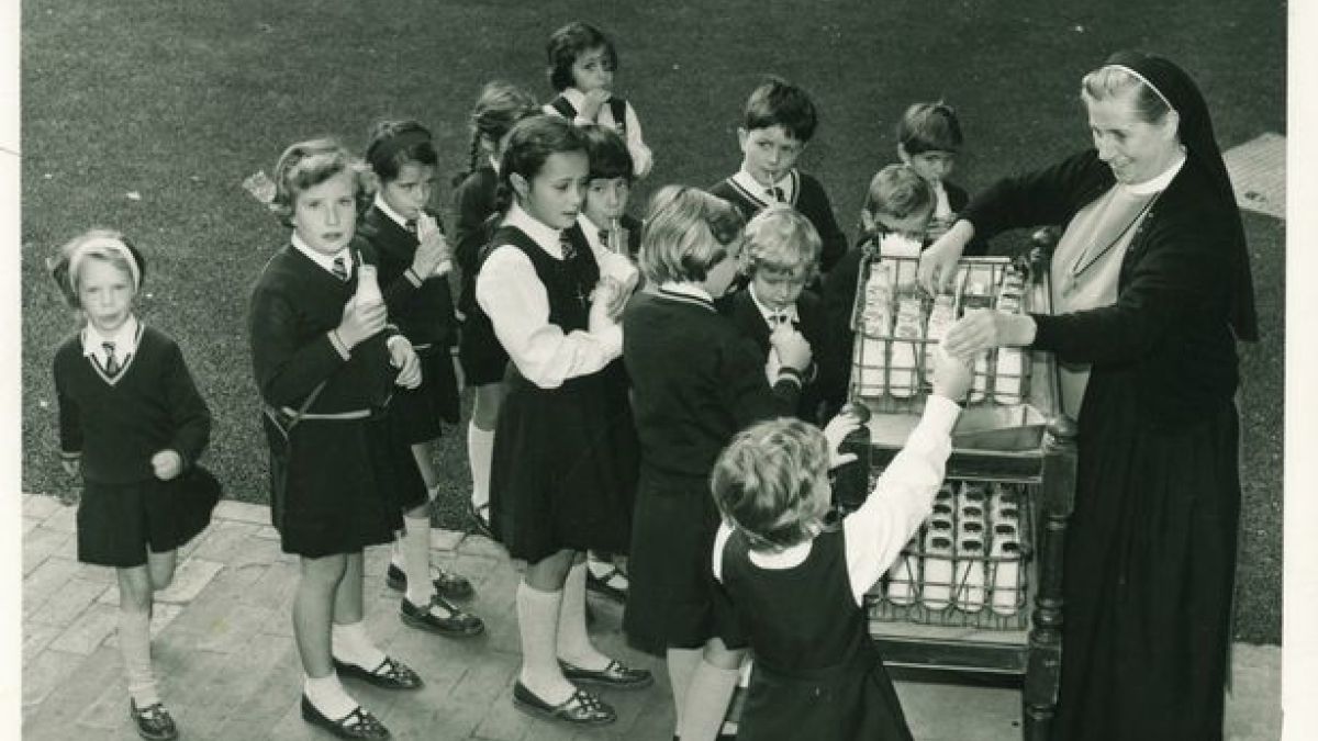 Sister Patricia Distributing Milk At Break Time At Rydes Hill